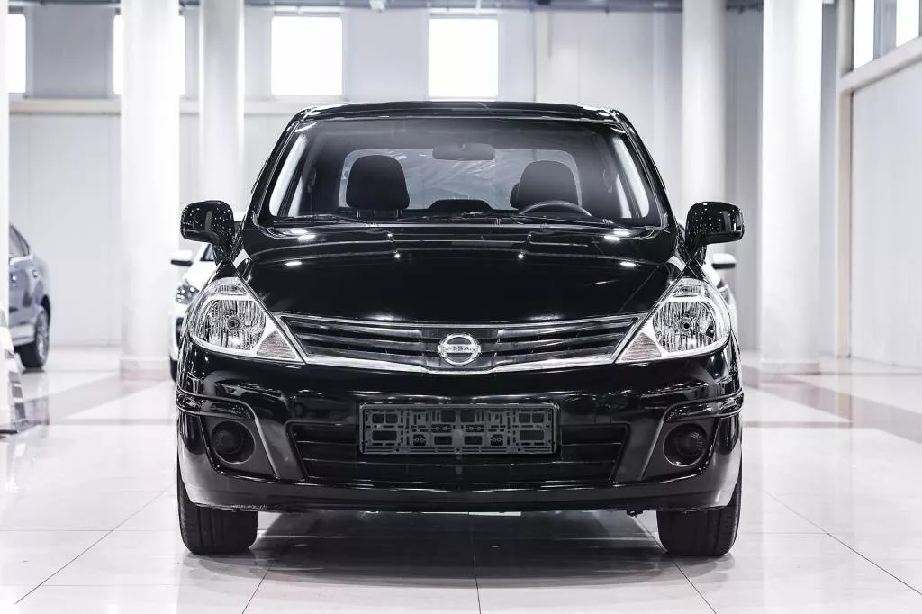 Купить Tiida с пробегом